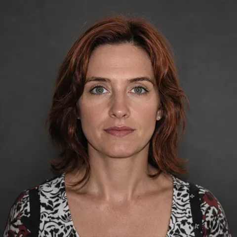 Redacted portrait of person of interest one